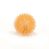 Boule de chat avec lampe orange